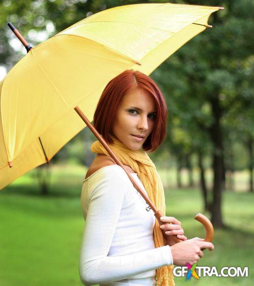 Women And Umbrella - Shutterstock 200xjpg