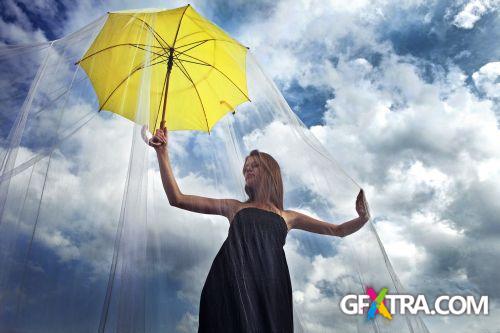 Women And Umbrella - Shutterstock 200xjpg