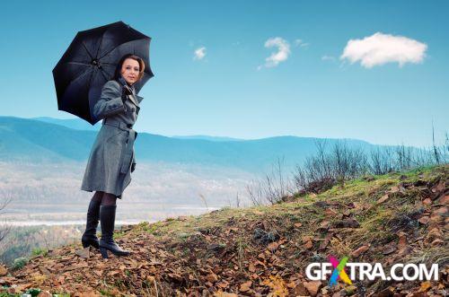 Women And Umbrella - Shutterstock 200xjpg