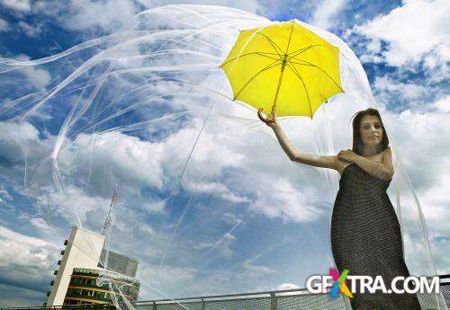 Women And Umbrella - Shutterstock 200xjpg