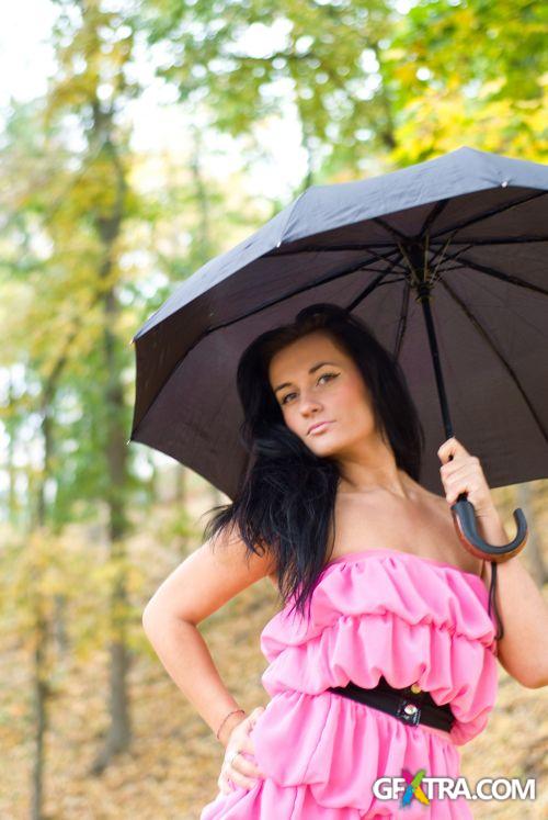 Women And Umbrella - Shutterstock 200xjpg