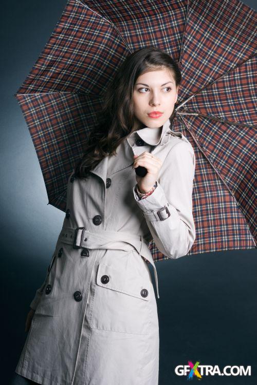 Women And Umbrella - Shutterstock 200xjpg