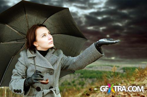 Women And Umbrella - Shutterstock 200xjpg