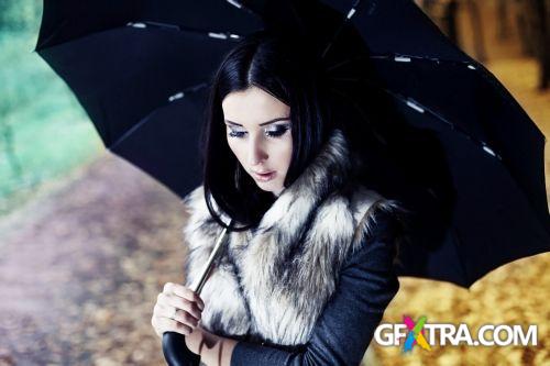 Women And Umbrella - Shutterstock 200xjpg