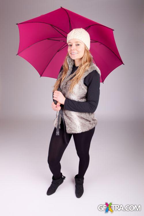 Women And Umbrella - Shutterstock 200xjpg