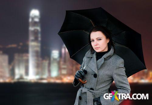 Women And Umbrella - Shutterstock 200xjpg