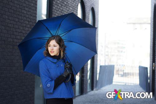 Women And Umbrella - Shutterstock 200xjpg