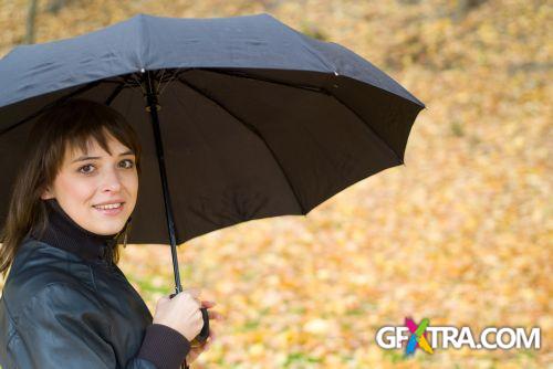 Women And Umbrella - Shutterstock 200xjpg