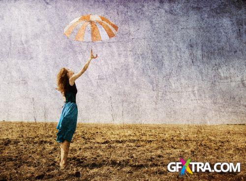 Women And Umbrella - Shutterstock 200xjpg