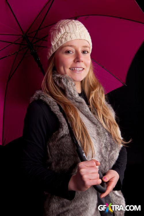 Women And Umbrella - Shutterstock 200xjpg