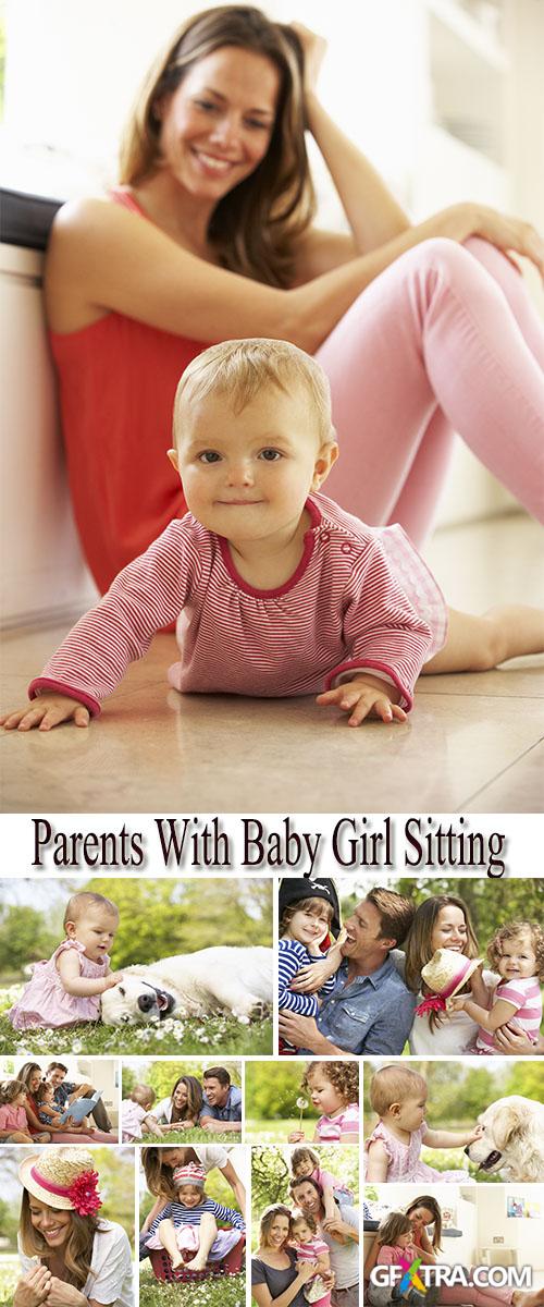 Stock Photo: Parents With Baby Girl Sitting