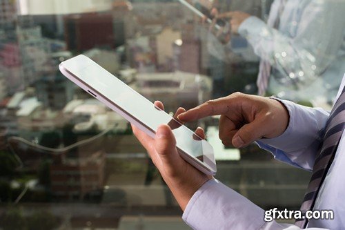 Stock Photos - Businessman with tablet, 25xJPG