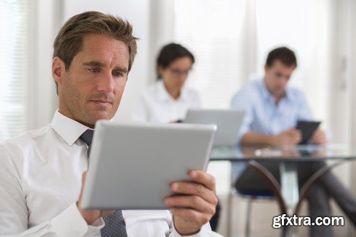 Stock Photos - Businessman with tablet, 25xJPG