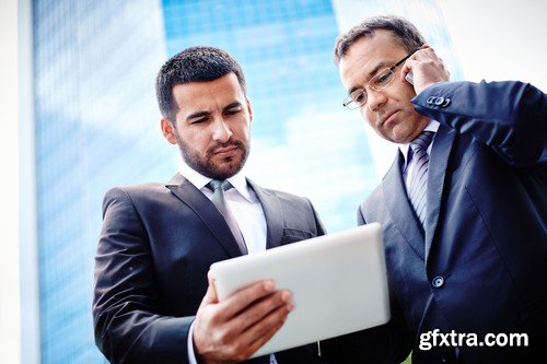 Stock Photos - Businessman with tablet, 25xJPG