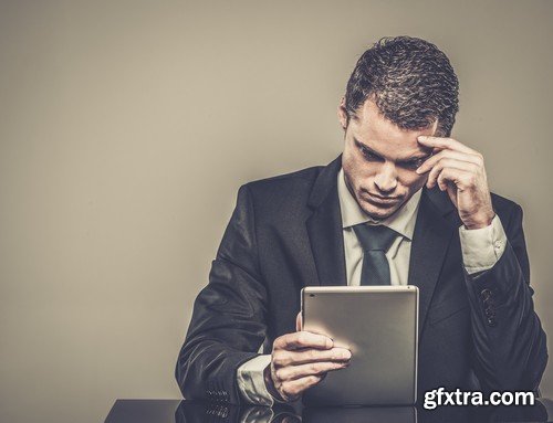 Stock Photos - Businessman with tablet, 25xJPG