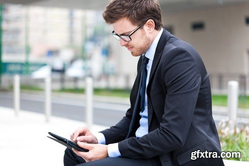 Stock Photos - Businessman with tablet, 25xJPG