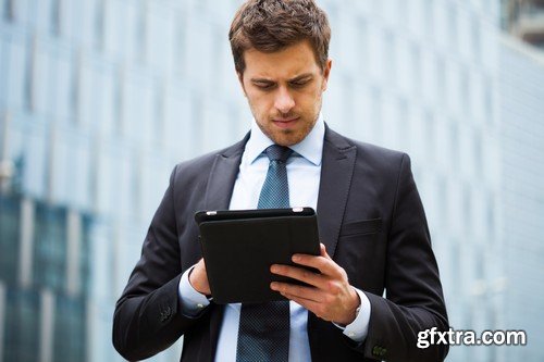 Stock Photos - Businessman with tablet, 25xJPG