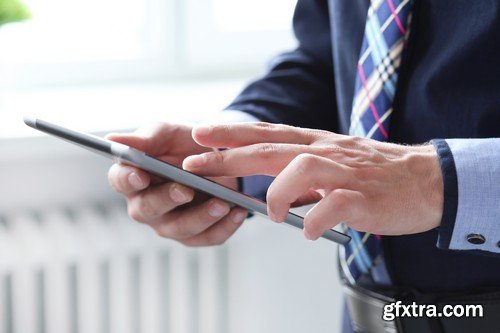 Stock Photos - Businessman with tablet 2, 25xJPG