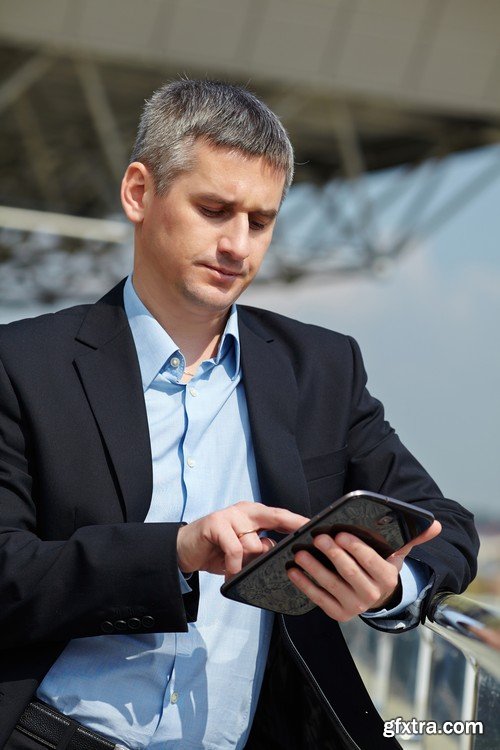 Stock Photos - Businessman with tablet 2, 25xJPG