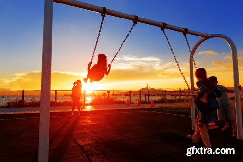 Collection of children on a swing 25 HQ Jpeg