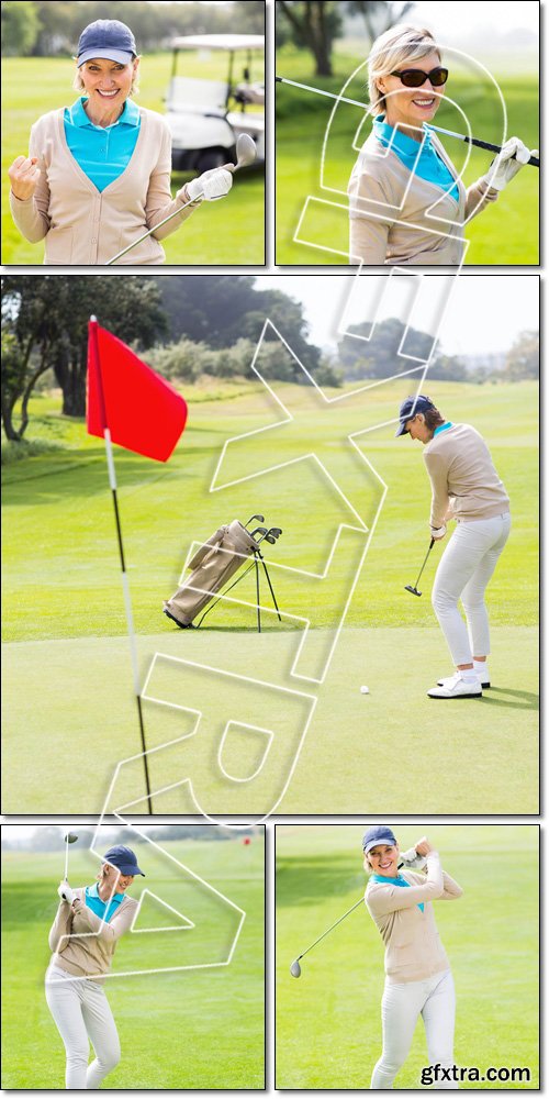 Female, cheerful golfer, taking a shot, smiling at camera - Stock photo