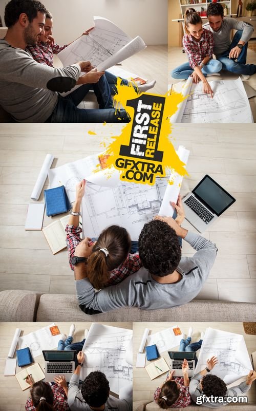 Stock Photos - Young Couple Examing Blueprints of they New House