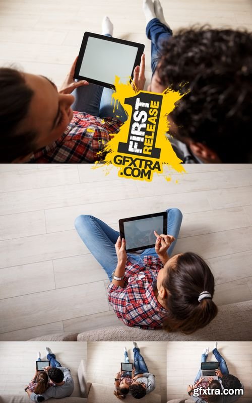 Stock Photos - Young Couple Sitting Using Laptop & Tablet