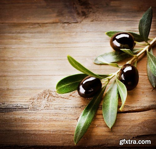 Olives in oil on a wooden surface 13x JPEG