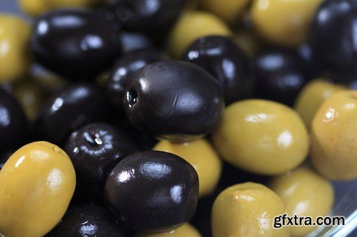 Olives in oil on a wooden surface 13x JPEG