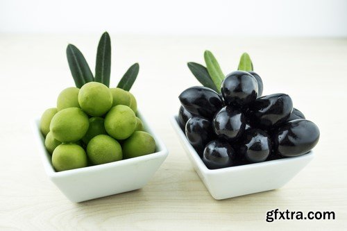 Olives in oil on a wooden surface 13x JPEG