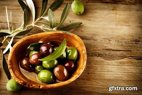 Olives in oil on a wooden surface 13x JPEG