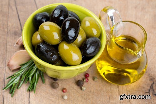 Olives in oil on a wooden surface 13x JPEG