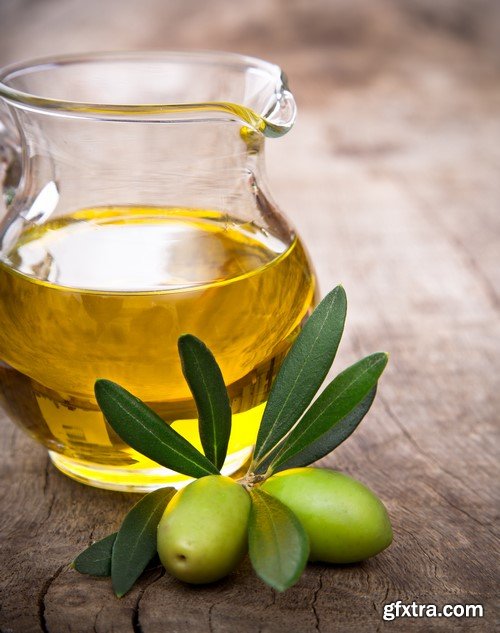 Olives in oil on a wooden surface 13x JPEG