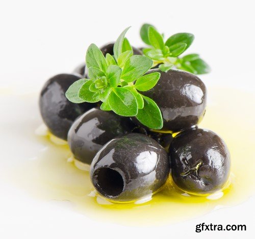 Olives in oil on a wooden surface 13x JPEG