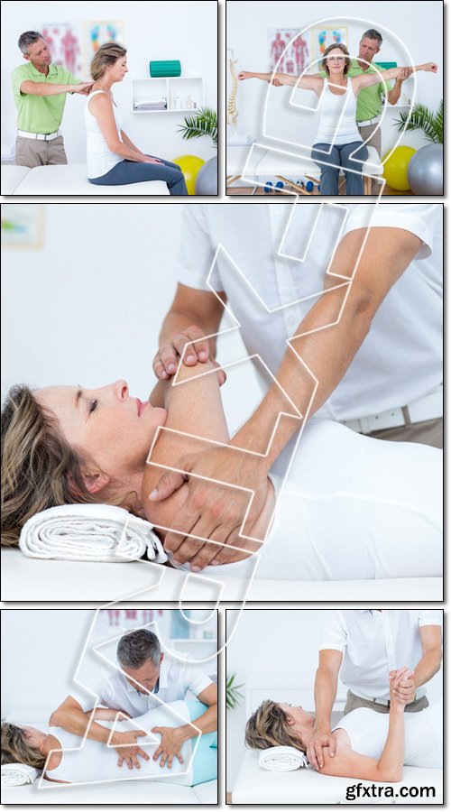 Doctor stretching his patients, doing back adjustment - Stock photo