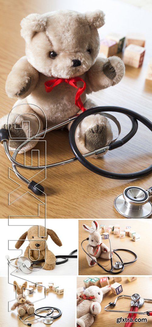 Stock Photos - Animal. Pediatrics. Puppy toy with medical equipment