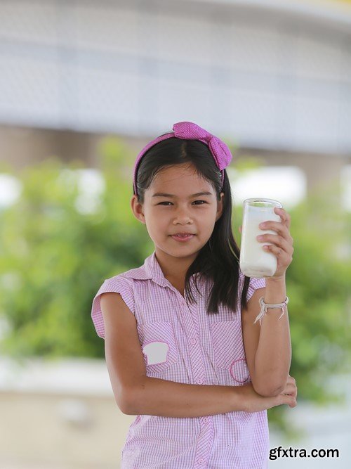 Child with glass of milk