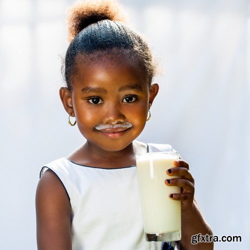 Child with glass of milk