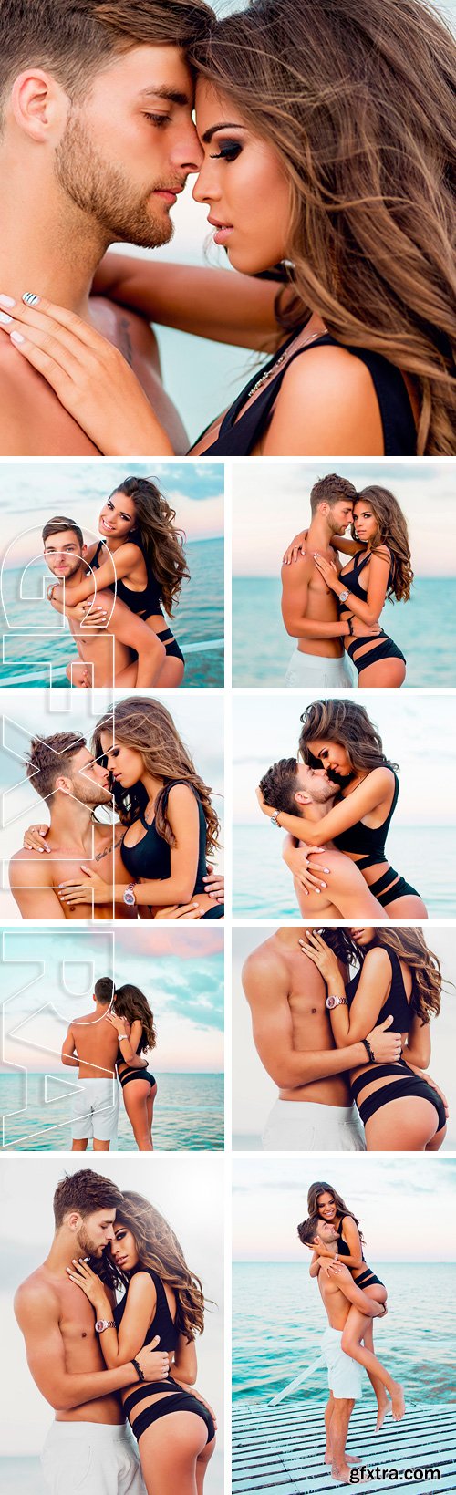 Stock Photos - Portrait of romantic attractive sensual couple in love hugging . Sexy woman and handsome man posing on the beach