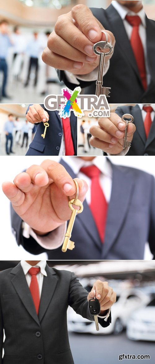 Stock Photo - Man Giving a Keys