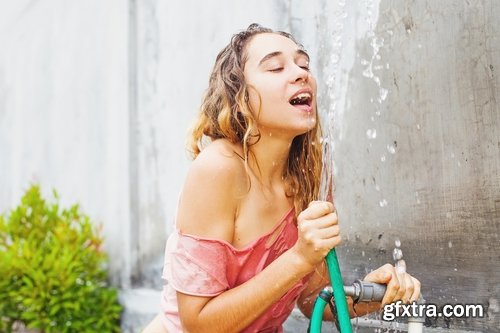 Collection of girl with a hose watering the lawn water cleaning 25 HQ Jpeg