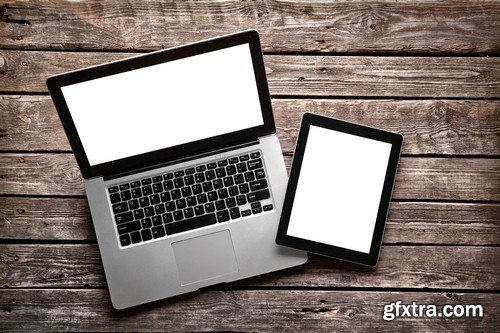 The laptop on a wooden table