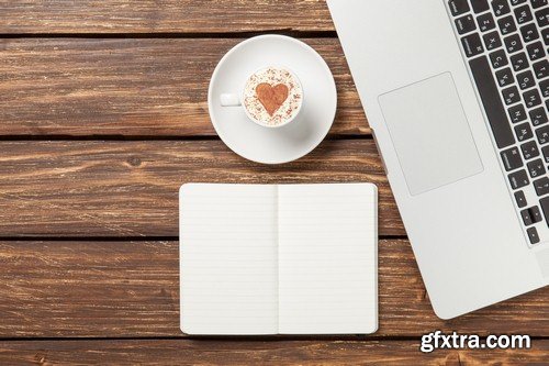 The laptop on a wooden table