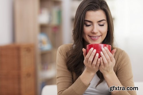 Collection female girl indoors on the couch with a laptop and phone 25 HQ Jpeg