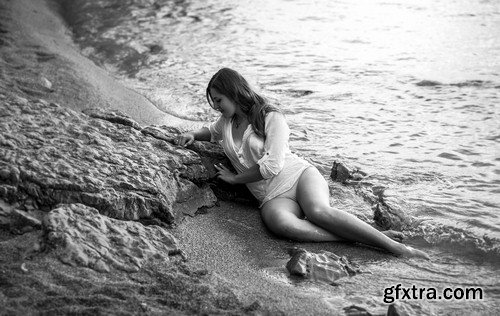 Girl on the rocky beach