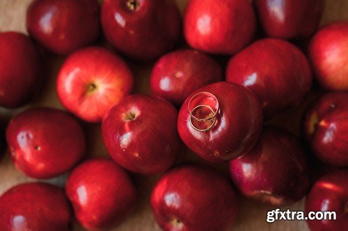 Wedding rings on autumn background