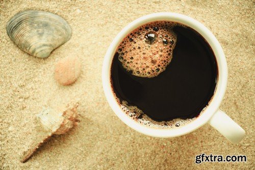 Cup of coffee on the sand