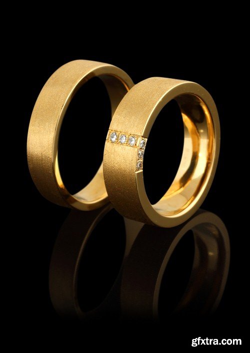 Wedding rings on a black background