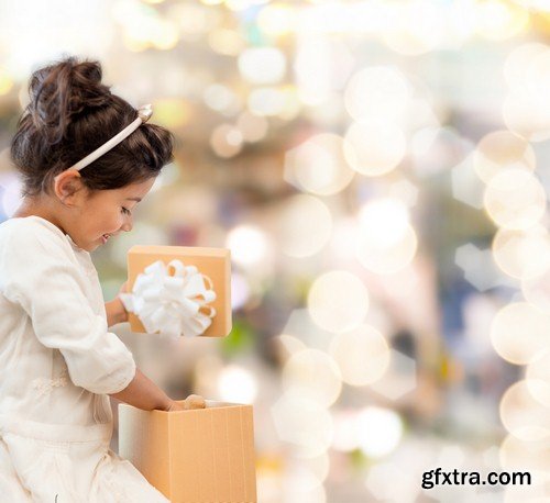 Christmas child with a box