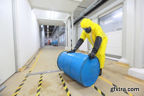 Worker in protective chemical suit 12X JPEG